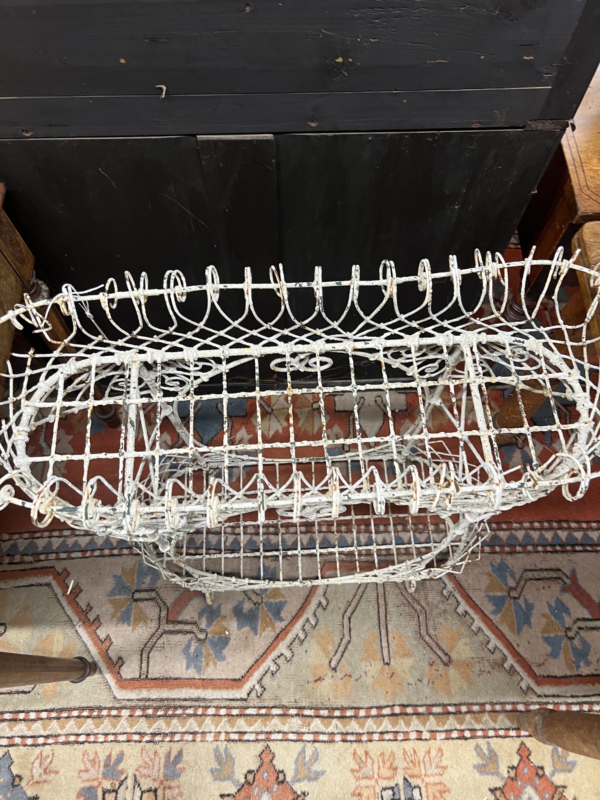 A Victorian painted wirework two tier pot stand, width 79cm, height 82cm